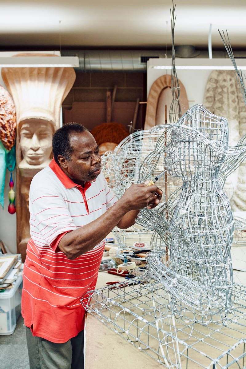 man making wire sculpture